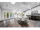 Bright, open kitchen featuring a dining area, stainless steel appliances, and skylights at 6112 E Jenan Dr, Scottsdale, AZ 85254