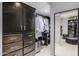 Well-organized walk-in closet featuring custom storage, shelving, and hanging racks at 6112 E Jenan Dr, Scottsdale, AZ 85254