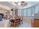Bright dining area showcasing seamless access to the kitchen and living room at 6311 E Ivy St, Mesa, AZ 85205
