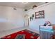 Spacious living room with neutral walls, tile flooring, and comfortable seating, offering ample space at 6311 E Ivy St, Mesa, AZ 85205