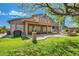 Spacious backyard features a covered patio, a barbecue, and comfortable outdoor seating, perfect for entertaining at 6350 S Four Peaks Pl, Chandler, AZ 85249