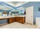 Bathroom featuring dual sinks, wood cabinets, vanity and tile flooring at 6350 S Four Peaks Pl, Chandler, AZ 85249