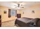 Bedroom featuring comic-themed wall decor and a cozy gray comforter at 6350 S Four Peaks Pl, Chandler, AZ 85249