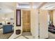 Warm and welcoming entryway featuring neutral tones and access to multiple living spaces at 6350 S Four Peaks Pl, Chandler, AZ 85249