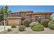 Beautiful two-story home with a two-car garage and low maintenance desert landscaping at 6350 S Four Peaks Pl, Chandler, AZ 85249