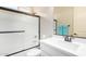 Bathroom featuring glass enclosed shower and white vanity at 6912 E Quill St, Mesa, AZ 85207