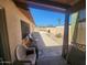 Relaxing back patio with view of pool and desert landscape at 7311 S Mcallister Ave, Tempe, AZ 85283