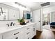 Modern bathroom with dual sinks, sleek countertops, and updated fixtures at 7350 N Via Paseo Del Sur -- # P105, Scottsdale, AZ 85258