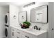 Modern bathroom featuring double sinks, vanities, mirrors and matte black hardware at 7350 N Via Paseo Del Sur -- # P105, Scottsdale, AZ 85258