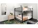 Charming bedroom featuring a bunk bed and stylish decor with a rug and bedside table at 7350 N Via Paseo Del Sur -- # P105, Scottsdale, AZ 85258