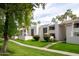 Clean condo exterior with sidewalk, manicured lawn and desert landscaping at 7350 N Via Paseo Del Sur -- # P105, Scottsdale, AZ 85258
