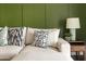 Comfortable living room sofa featuring stylish pillows, lamp, and an end table at 7350 N Via Paseo Del Sur -- # P105, Scottsdale, AZ 85258