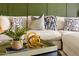 Close up of a cozy living room sofa adorned with decorative pillows and stylish accents at 7350 N Via Paseo Del Sur -- # P105, Scottsdale, AZ 85258