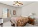 Cozy bedroom offers natural light, a comfortable bed, and a tranquil space at 7575 E Indian Bend Rd # 1137, Scottsdale, AZ 85250