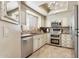 Modern kitchen with stainless steel appliances, tile backsplash, and stylish countertops at 7575 E Indian Bend Rd # 1137, Scottsdale, AZ 85250