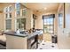 Convenient kitchenette area with modern appliances, stylish cabinetry, and tiled floors, perfect for entertaining guests at 7575 E Indian Bend Rd # 1137, Scottsdale, AZ 85250