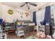 Fun bedroom featuring a loft bed with plenty of storage at 7608 W Mescal St, Peoria, AZ 85345