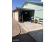 View of the carport attached to the property, showing the interior and concrete flooring at 7608 W Mescal St, Peoria, AZ 85345
