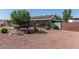 Charming single-story home featuring a well-maintained front yard, lush landscaping, and a welcoming exterior at 7608 W Mescal St, Peoria, AZ 85345