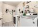 Laundry room equipped with modern washer and dryer at 7608 W Mescal St, Peoria, AZ 85345