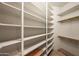 Walk-in closet with shelving at 8429 E Del Camino Dr, Scottsdale, AZ 85258