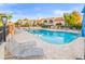 Inviting community pool area with lounge chairs and well-maintained landscaping at 8429 E Del Camino Dr, Scottsdale, AZ 85258