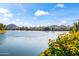Scenic lake view with mountains in the background at 8429 E Del Camino Dr, Scottsdale, AZ 85258