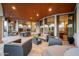 Beautiful outdoor patio with lounge seating, a dining table and spa at 8429 E Del Camino Dr, Scottsdale, AZ 85258
