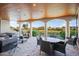 Relaxing outdoor patio with comfortable seating and scenic lake views at 8429 E Del Camino Dr, Scottsdale, AZ 85258