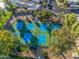Overhead view of community pickleball courts surrounded by mature trees and landscaping at 8429 E Del Camino Dr, Scottsdale, AZ 85258