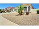Cozy home with manicured desert landscaping, a long driveway and plenty of curb appeal at 8854 W Augusta Ave, Glendale, AZ 85305
