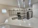 Bright kitchen features granite countertops, stainless steel appliances, and stylish backsplash at 8854 W Augusta Ave, Glendale, AZ 85305