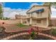 Back of house featuring a covered patio, balcony, and an outdoor pizza oven at 917 N Blackbird Dr, Gilbert, AZ 85234