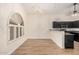 Dining area with stylish lighting, window seat, and open access to the kitchen at 917 N Blackbird Dr, Gilbert, AZ 85234