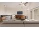 Cozy living room with a sofa, stylish decor, and natural light streaming in at 917 N Blackbird Dr, Gilbert, AZ 85234