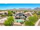Beautiful desert backyard with a covered patio and private pool with desert landscaping at 9203 E Topeka Dr, Scottsdale, AZ 85255