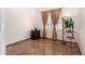 Neutral bedroom with tiled flooring, window, and plant at 9203 E Topeka Dr, Scottsdale, AZ 85255