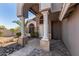 View of the front door and entryway with tiled accents at 9203 E Topeka Dr, Scottsdale, AZ 85255