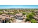 Charming two-story home with a well-manicured front yard in a scenic neighborhood and a two car garage at 9203 E Topeka Dr, Scottsdale, AZ 85255