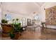 Bright living room featuring neutral tones, tile floors, and large windows at 9203 E Topeka Dr, Scottsdale, AZ 85255