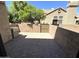 Backyard patio features brick pavers and a block fence at 921 W University Dr # 1038, Mesa, AZ 85201