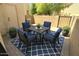 Outdoor patio with dining set and potted plants creating a cozy atmosphere at 921 W University Dr # 1038, Mesa, AZ 85201