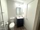 Bathroom with a modern toilet and vanity, providing a clean and efficient design at 921 W University Dr # 1038, Mesa, AZ 85201