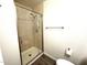 Modern bathroom showcasing a glass-enclosed shower with sleek hardware at 921 W University Dr # 1038, Mesa, AZ 85201