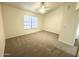 Bright bedroom featuring carpet and a ceiling fan at 921 W University Dr # 1038, Mesa, AZ 85201