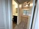 View into a bedroom with neutral walls, carpet, and a window at 921 W University Dr # 1038, Mesa, AZ 85201