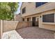Cozy brick-paved patio enclosed by a block wall, perfect for outdoor relaxation at 921 W University Dr # 1038, Mesa, AZ 85201