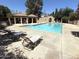 Community pool with clear water and lounge chairs for relaxation at 921 W University Dr # 1038, Mesa, AZ 85201