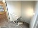 Staircase with modern white railing leads to the upper level at 921 W University Dr # 1038, Mesa, AZ 85201