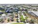Aerial view of the neighborhood showcasing a green space with a playground at 9750 E Radioactive Dr, Mesa, AZ 85212